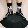 A NIGHTMARE BEFORE CHRISTMAS JACK SKELLINGTON BLACK ADULT PAIR OF NOVELTY SOCKS