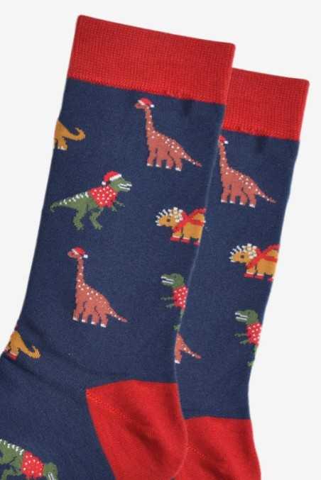 DINOSAURS WEARING CHRISTMAS JUMPERS AND SANTA HATS BLUE ADULT PAIR OF NOVELTY SOCKS