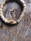 SOLAR WIND Burnt out pendant with light brown elasticated coco wood Bracelet